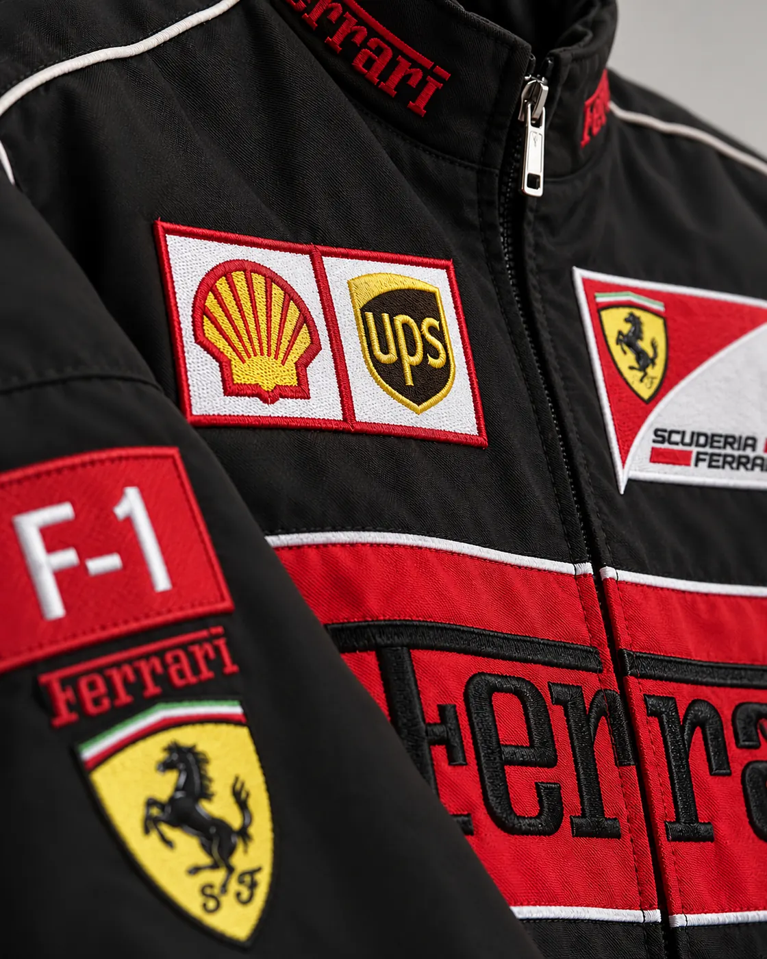 Close-up of embroidered Shell and UPS racing patches